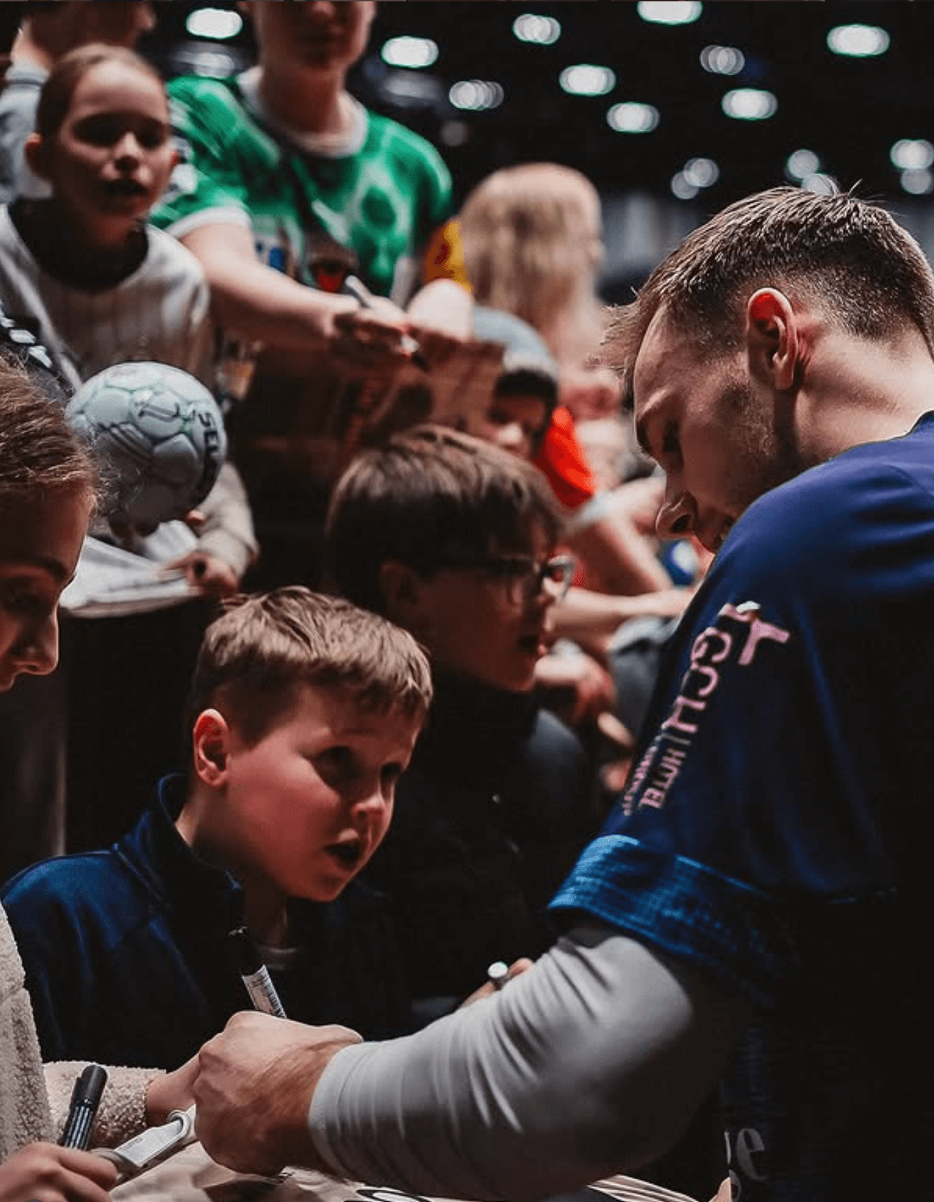 Mathias Gidsel signing autographs for fans